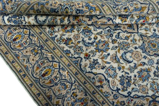Close-up detail of 2000s Kashan rug from Iran / Persia showing Wool weave