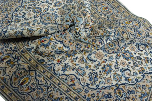 Surface texture of 2000s Kashan rug with natural Wool and intricate pattern