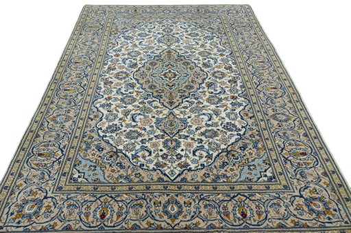 Surface texture of 2000s Kashan rug with natural Wool and intricate pattern