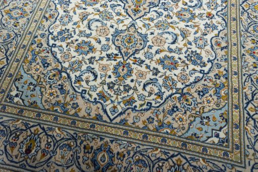Close-up detail of 2000s Kashan rug from Iran / Persia showing Wool weave