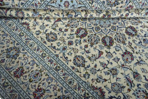 Close-up detail of 2000s Kashan rug from Iran / Persia showing Wool weave