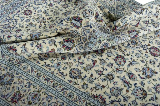 Surface texture of 2000s Kashan rug with natural Wool and intricate pattern