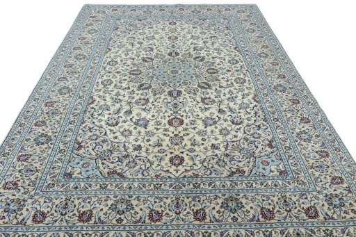 Surface texture of 2000s Kashan rug with natural Wool and intricate pattern