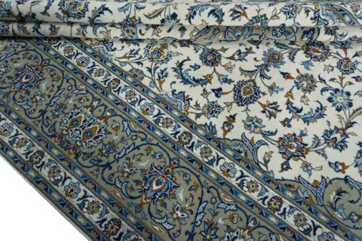 Close-up detail of 2000s Kashan rug from Iran / Persia showing Wool weave