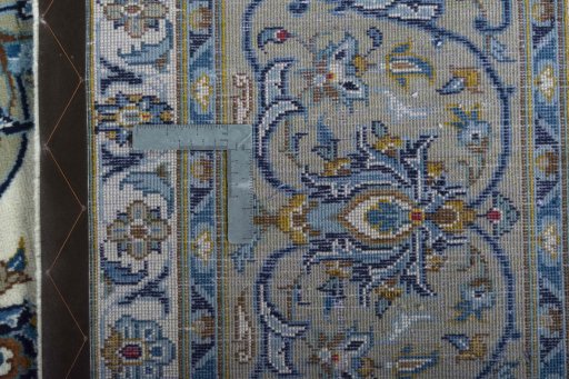 Central medallion detail of 2000s Kashan rug from Iran / Persia