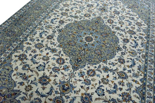 Backside of handmade 2000s Kashan rug showing knot structure and weave density