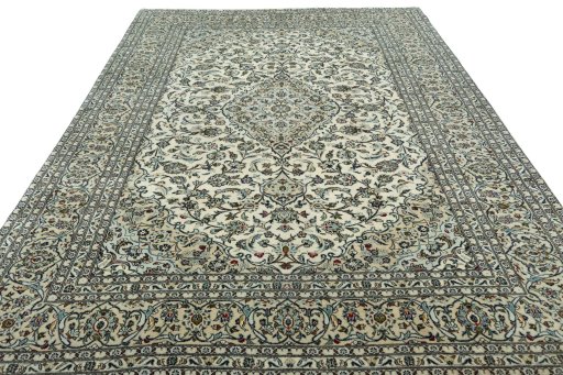 Surface texture of 2000s Kashan rug with natural Wool and intricate pattern