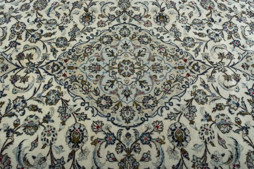 Central medallion detail of 2000s Kashan rug from Iran / Persia