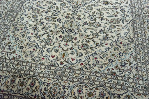 Close-up detail of 2000s Kashan rug from Iran / Persia showing Wool weave