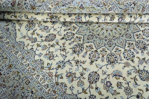 Close-up detail of 2000s Kashan rug from Iran / Persia showing Wool weave