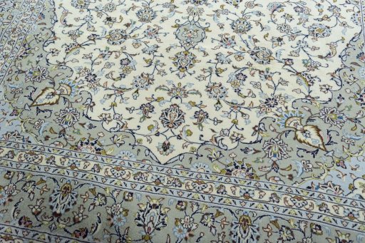 Close-up detail of 2000s Kashan rug from Iran / Persia showing Wool weave