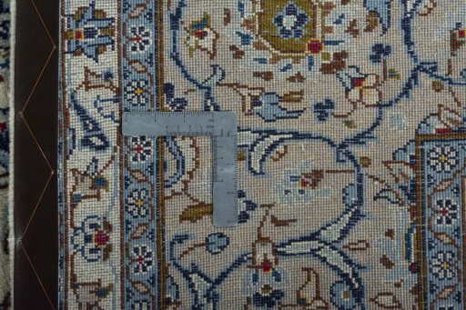Close-up detail of 2000s Kashan rug from Iran / Persia showing Wool weave