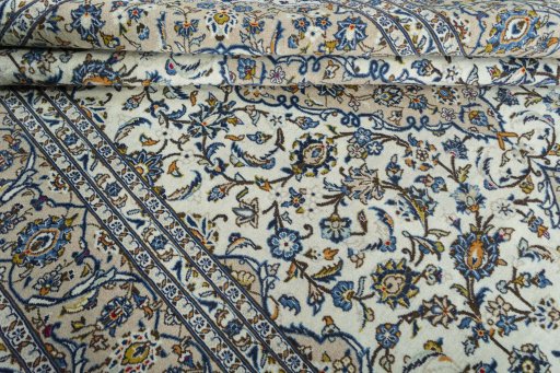 Close-up detail of 2000s Kashan rug from Iran / Persia showing Wool weave