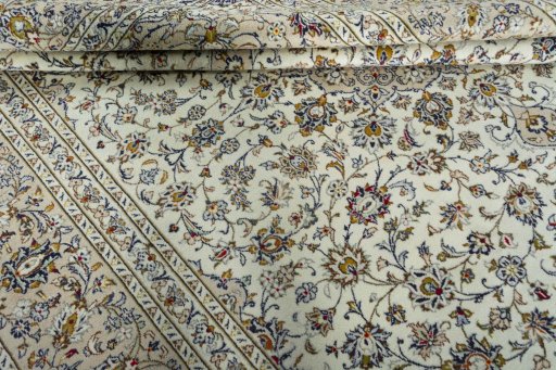 Close-up detail of 2000s Kashan rug from Iran / Persia showing Wool weave