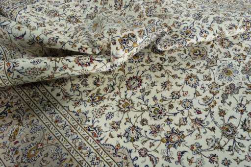 Surface texture of 2000s Kashan rug with natural Wool and intricate pattern