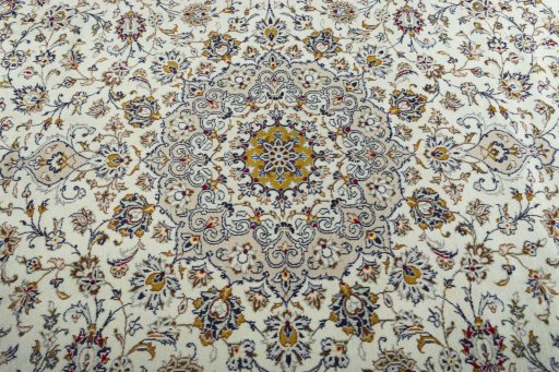 Central medallion detail of 2000s Kashan rug from Iran / Persia