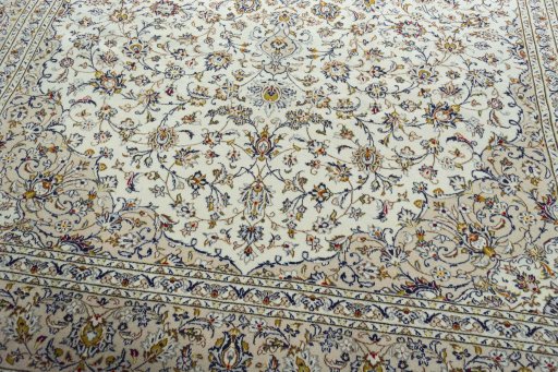 Close-up detail of 2000s Kashan rug from Iran / Persia showing Wool weave