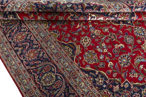 Close-up detail of 2000s Kashan rug from Iran / Persia showing Wool weave