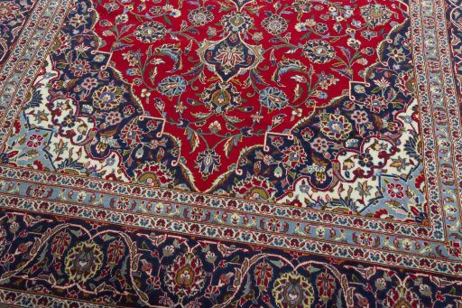 Close-up detail of 2000s Kashan rug from Iran / Persia showing Wool weave