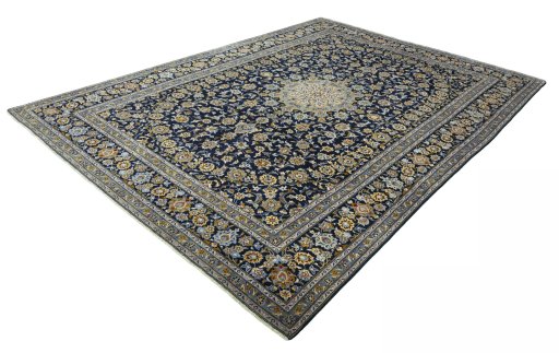 Corner detail of 2000s Kashan rug showing border pattern and Wool pile