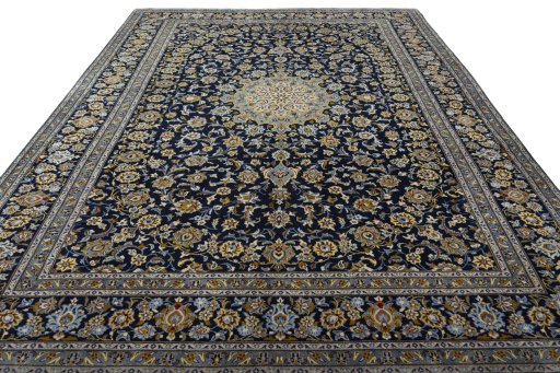 Surface texture of 2000s Kashan rug with natural Wool and intricate pattern