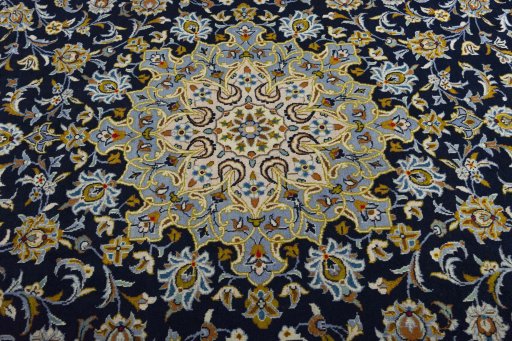 Central medallion detail of 2000s Kashan rug from Iran / Persia