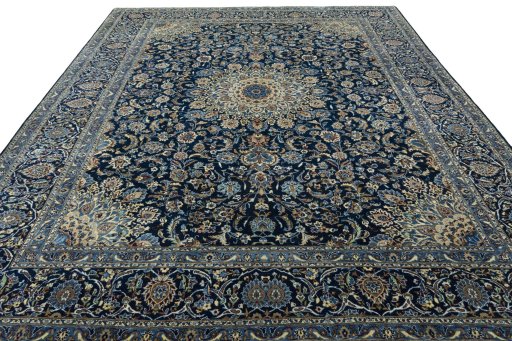 Surface texture of 2000s Kashan rug with natural Wool and intricate pattern
