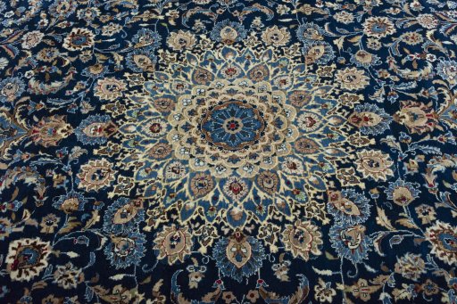Central medallion detail of 2000s Kashan rug from Iran / Persia
