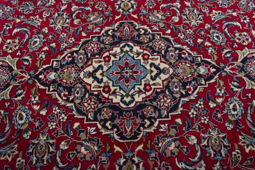 Central medallion detail of 2000s Kashan rug from Iran / Persia