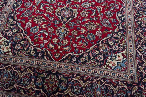 Close-up detail of 2000s Kashan rug from Iran / Persia showing Wool weave