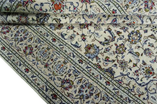 Close-up detail of 2000s Kashan rug from Iran / Persia showing Wool weave