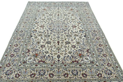 Surface texture of 2000s Kashan rug with natural Wool and intricate pattern