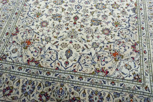 Close-up detail of 2000s Kashan rug from Iran / Persia showing Wool weave