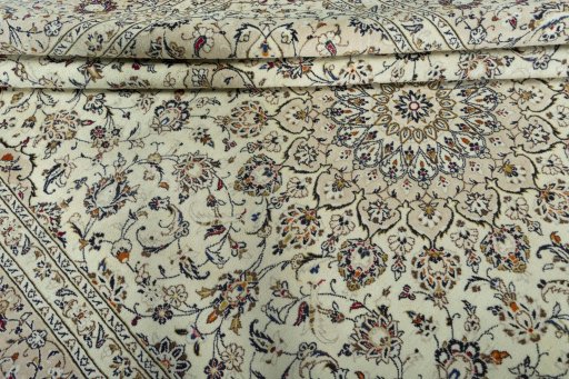 Close-up detail of 2000s Kashan rug from Iran / Persia showing Wool weave