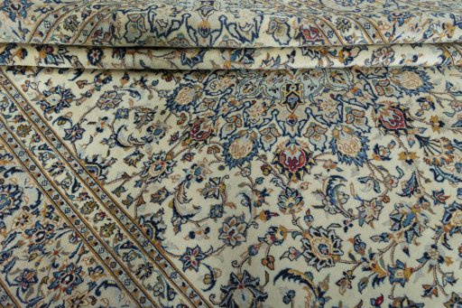 Close-up detail of 2000s Kashan rug from Iran / Persia showing Wool weave