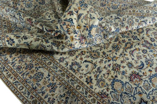 Surface texture of 2000s Kashan rug with natural Wool and intricate pattern