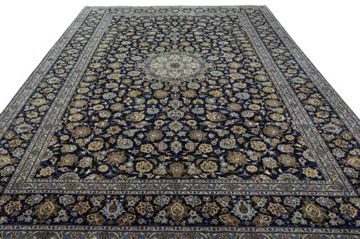 Surface texture of 2000s Kashan rug with natural Wool and intricate pattern