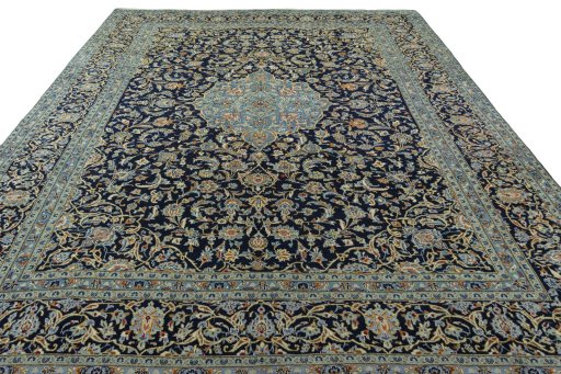 Surface texture of 2000s Kashan rug with natural Wool and intricate pattern