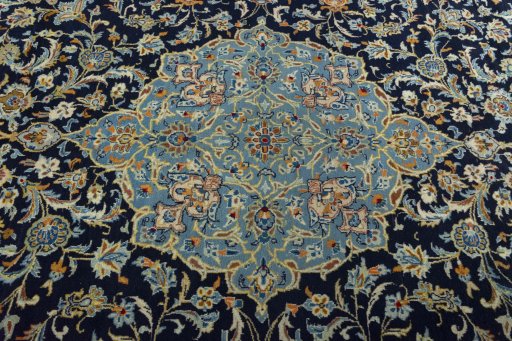 Central medallion detail of 2000s Kashan rug from Iran / Persia