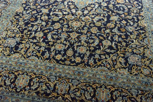 Close-up detail of 2000s Kashan rug from Iran / Persia showing Wool weave