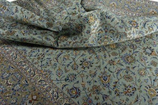 Surface texture of 2000s Kashan rug with natural Wool and intricate pattern