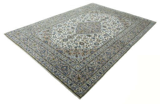 Corner detail of 2000s Kashan rug showing border pattern and Wool pile