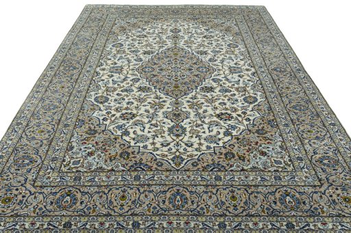 Surface texture of 2000s Kashan rug with natural Wool and intricate pattern