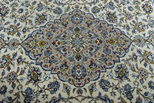 Central medallion detail of 2000s Kashan rug from Iran / Persia