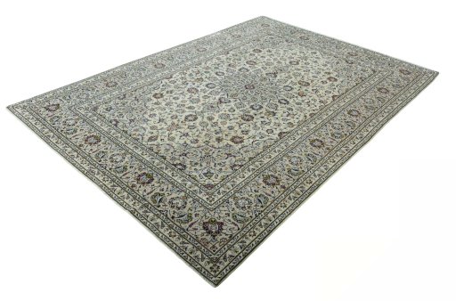 Corner detail of 2000s Kashan rug showing border pattern and Wool pile