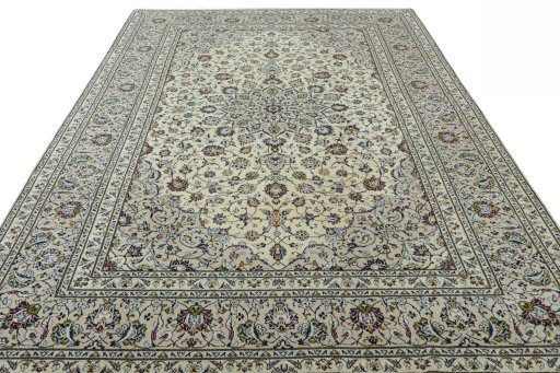 Surface texture of 2000s Kashan rug with natural Wool and intricate pattern