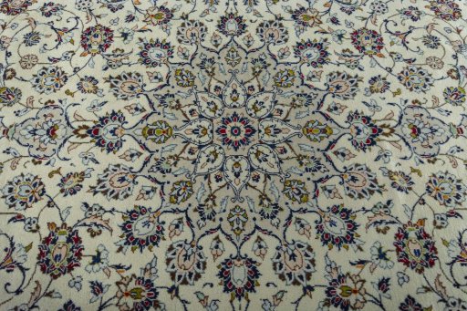 Central medallion detail of 2000s Kashan rug from Iran / Persia