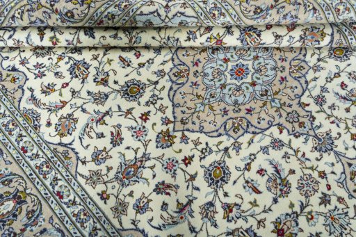 Close-up detail of 2000s Kashan rug from Iran / Persia showing Wool weave