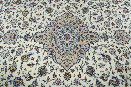 Central medallion detail of 2000s Kashan rug from Iran / Persia