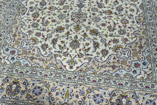 Close-up detail of 2000s Kashan rug from Iran / Persia showing Wool weave